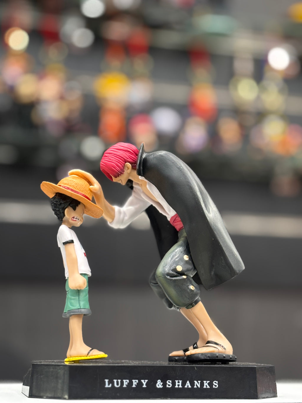 shanks giving luffy strawhat figure
